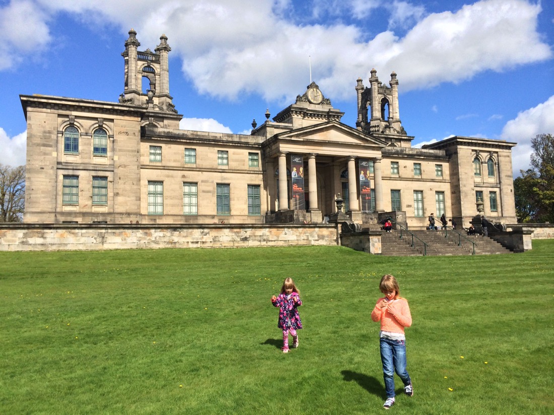 Blue skies, two girls outside National Modern Art Edinburgh