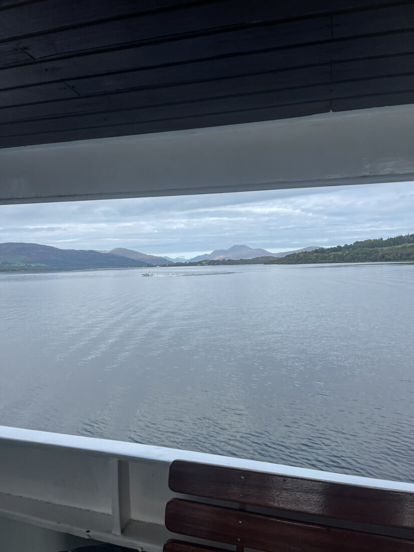 Window from Balloch cruise with mountains in view