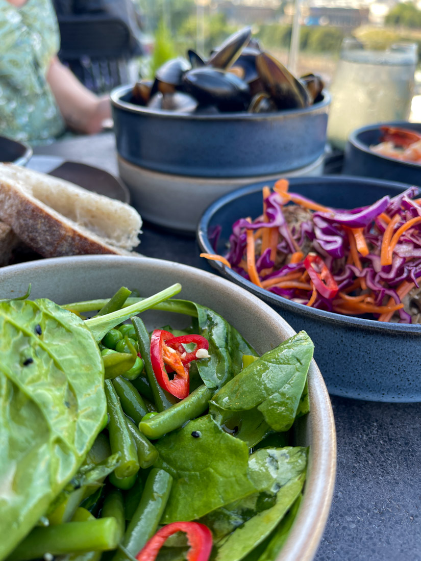 Nor Loft rooftop bar small plates including salad and mussels