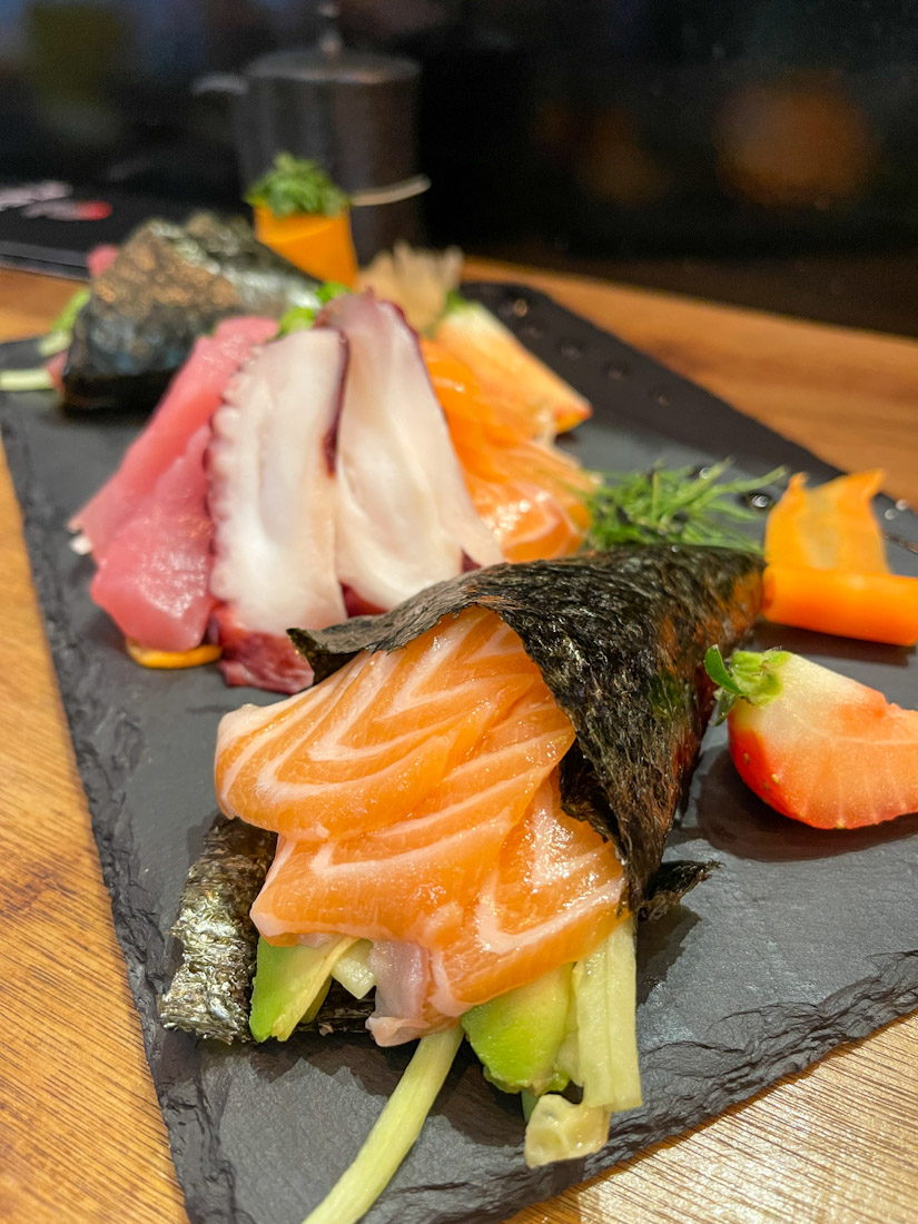 Shinsen Sushi tamaki hand roll sashimi on plate