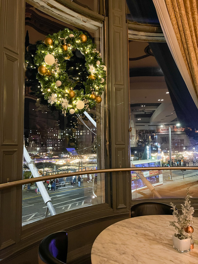 Christmas wreaths on windows of Twenty Twenty restaurant window with wreath