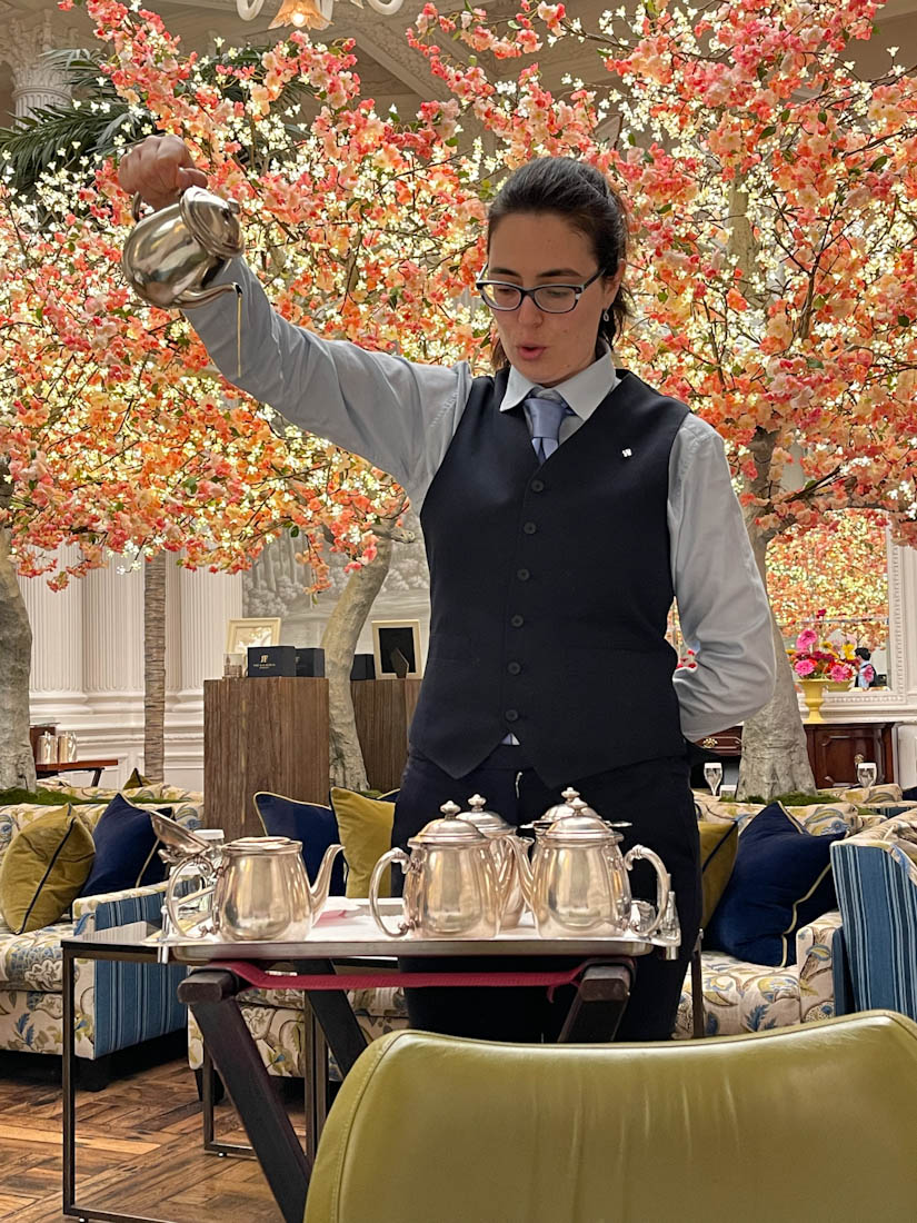 Server pouring tea at afternoon tea Balmoral Hotel