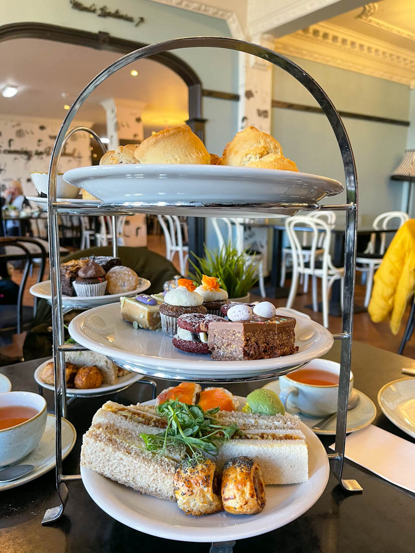 Trays of sandwiches and cakes afternoon tea platter at Mimi’s Bakehouse Leith Edinburgh
