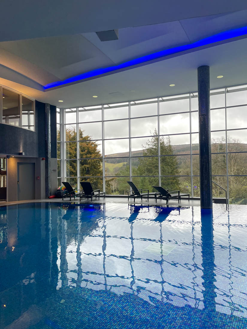 Stobo Castle pool and large window looking at landscape Scotland