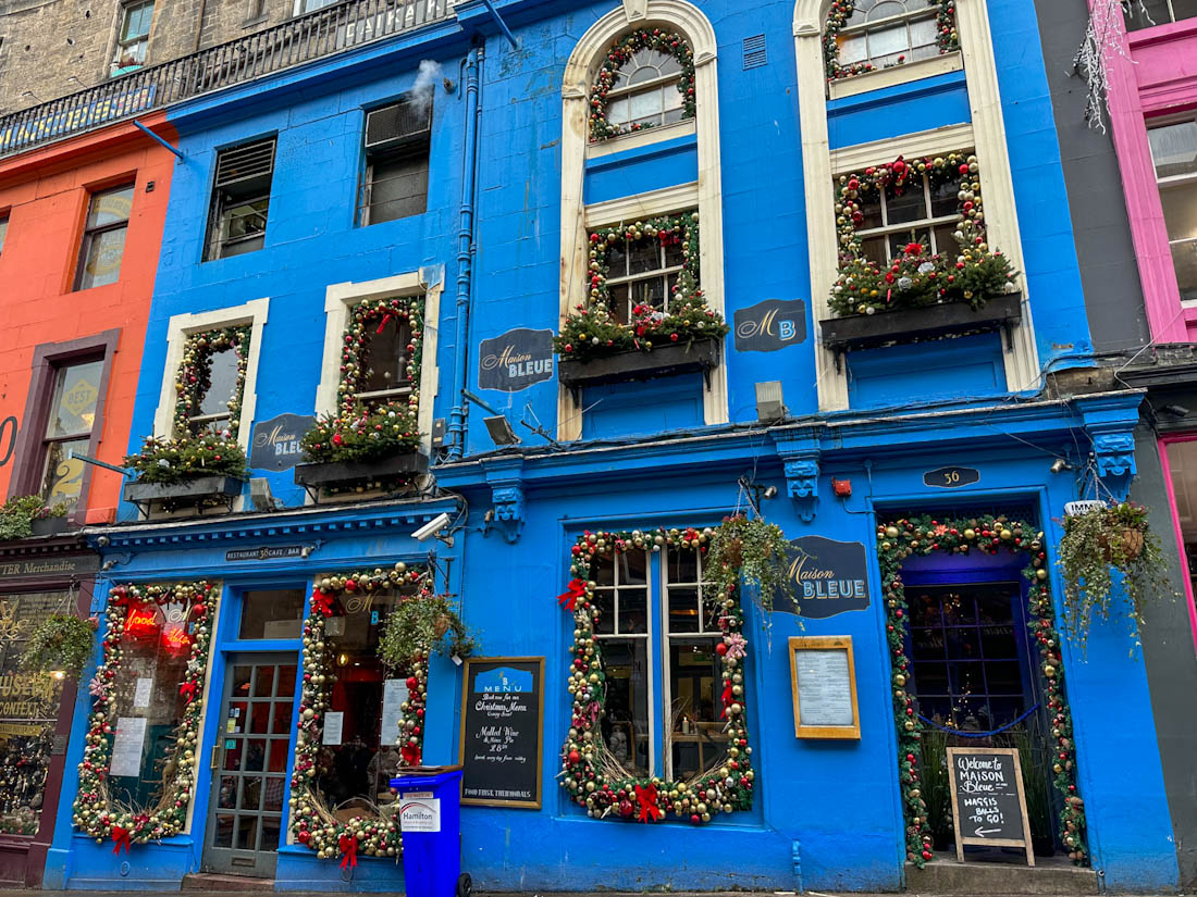 Maison Bleue blue painted restaurant with Christmas decorations in Edinburgh