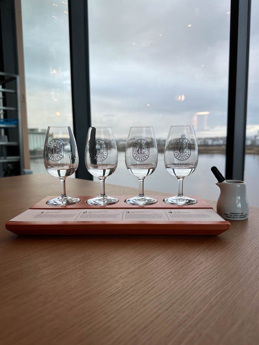 Port of Leith Distillery Whisky Flight with views of Forth of Firth in backgroun