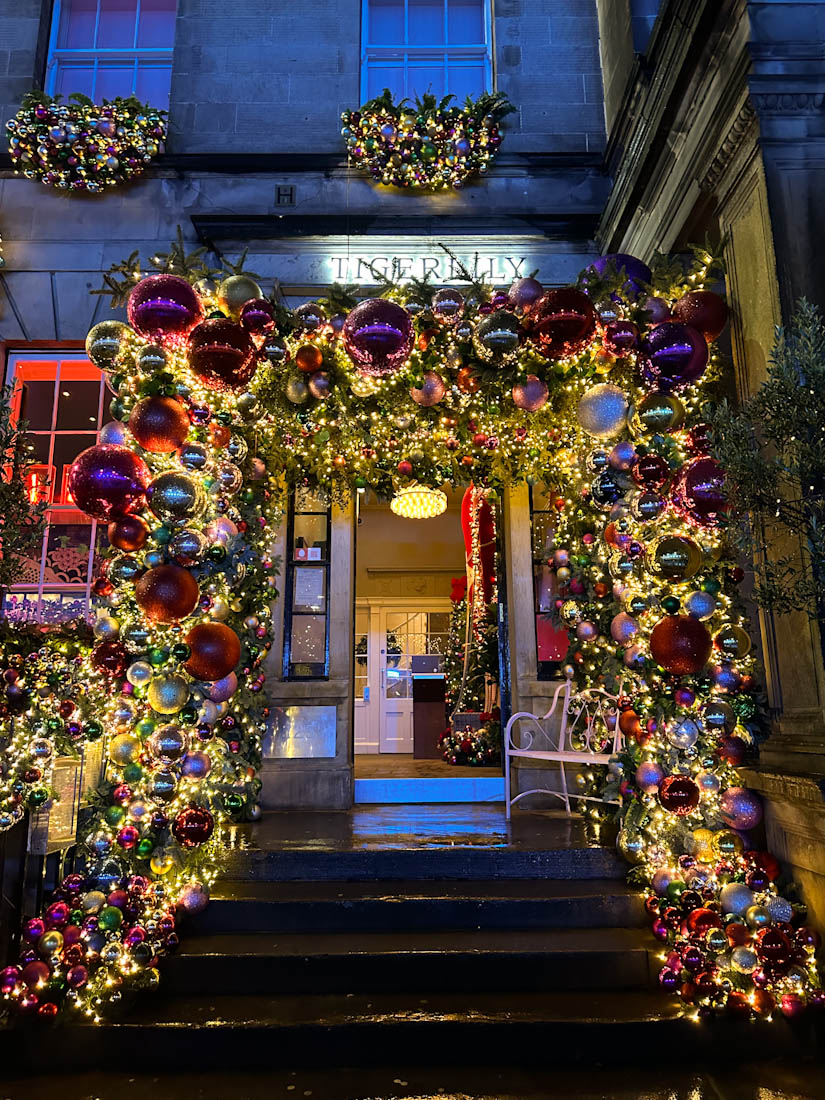 Tigerlily Bar Christmas Decorations around Door in Edinburgh